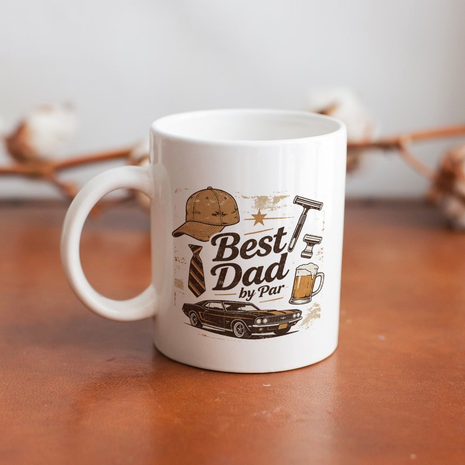 White ceramic mug with distressed "Best Dad by Par" print, styled on a warm wooden table as a classic everyday Father’s Day home decor piece.