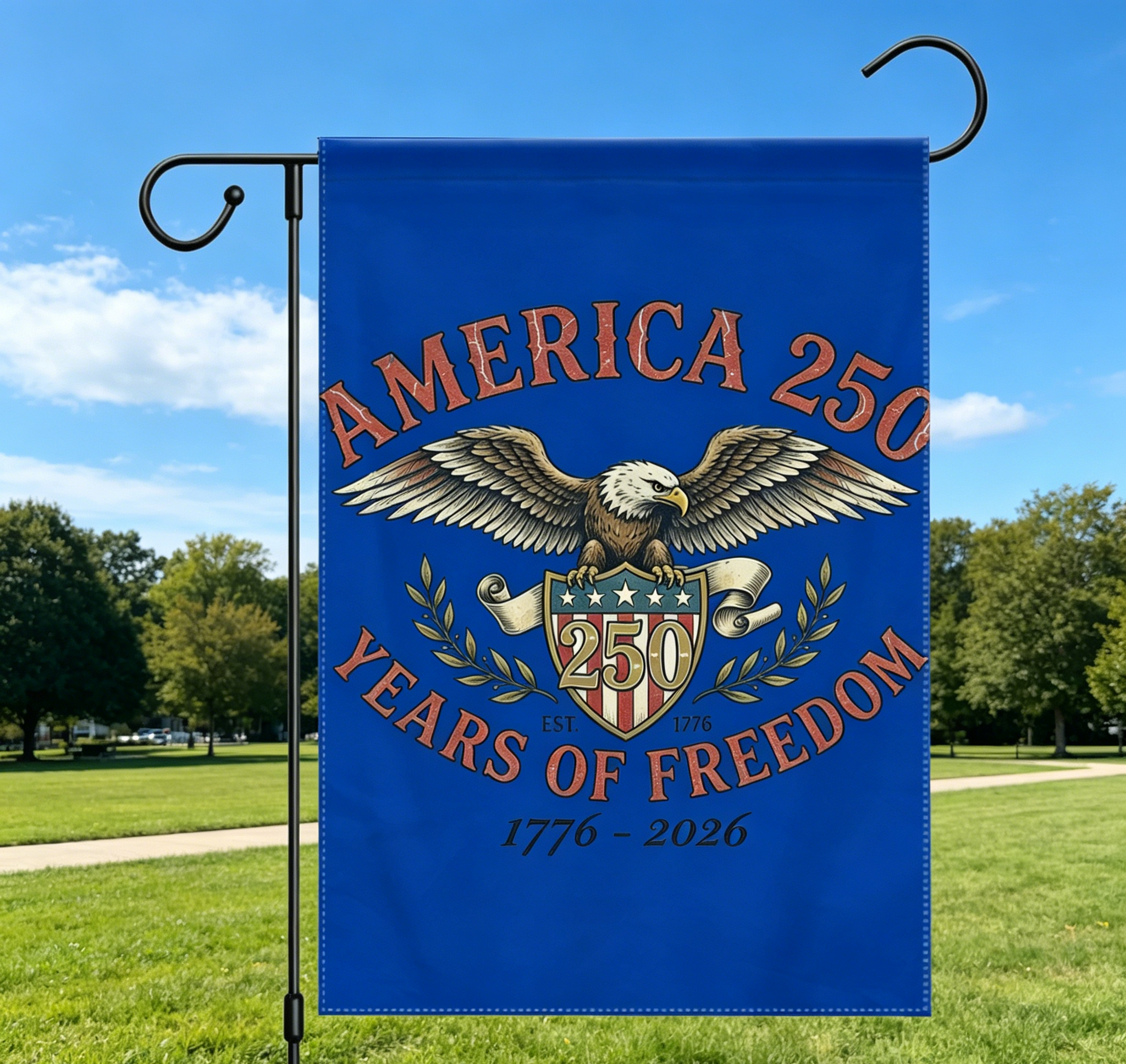 America 250th anniversary garden flag shown on a porch with an American flag, showcasing the vintage eagle design as part of patriotic outdoor decor.