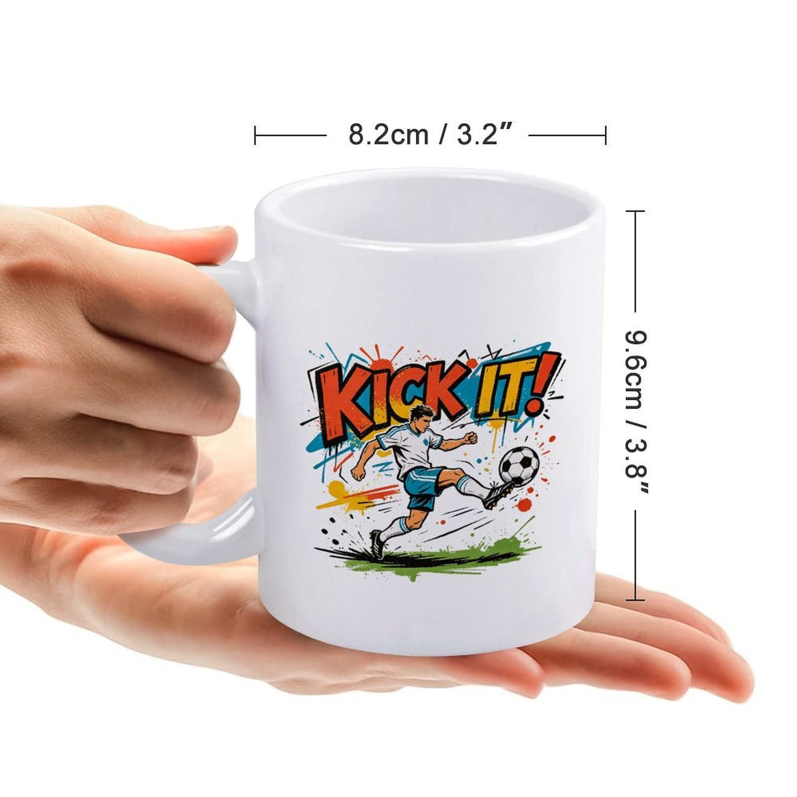 Hand‑held size reference for the “Kick It!” World Cup soccer mug, dimensions 8.2cm/3.2" diameter × 9.6cm/3.8" height, with a dynamic kicking footballer graphic.