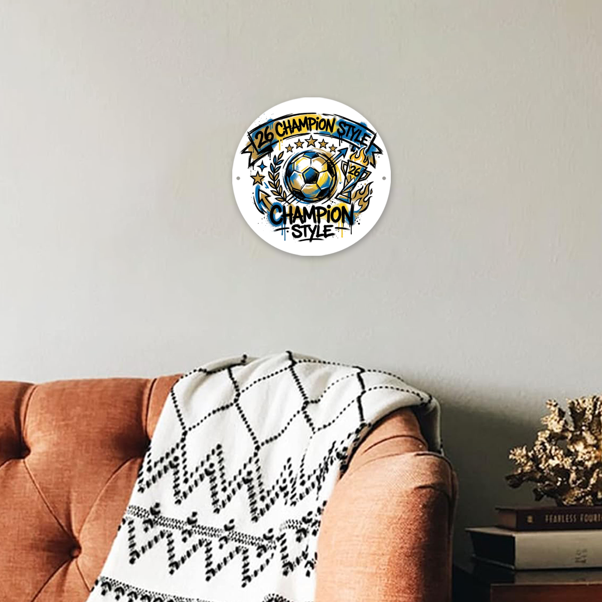 Lifestyle shot of the “26 Champion Style” aluminum sign mounted on a living room wall, showing home decor use