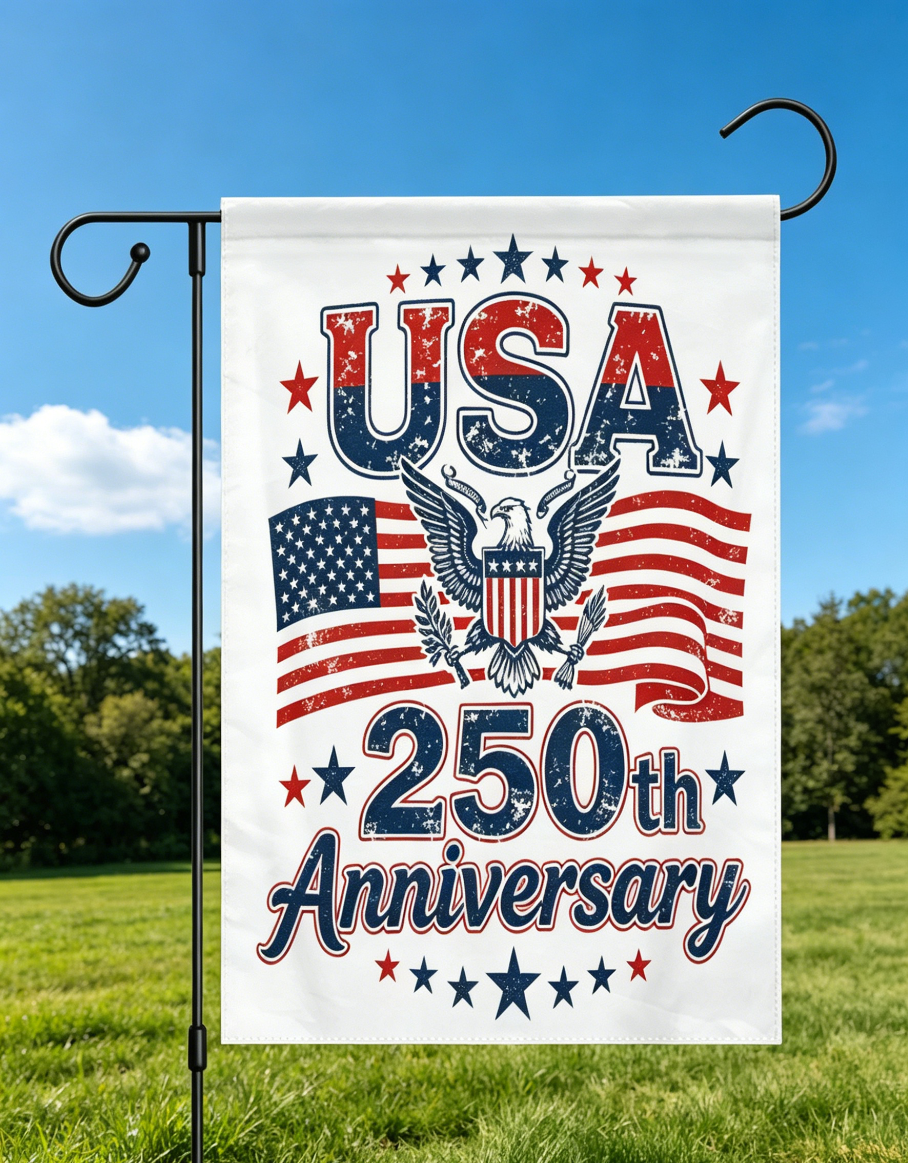 The USA 250th Anniversary garden flag displayed on a flagpole against a clear blue sky.