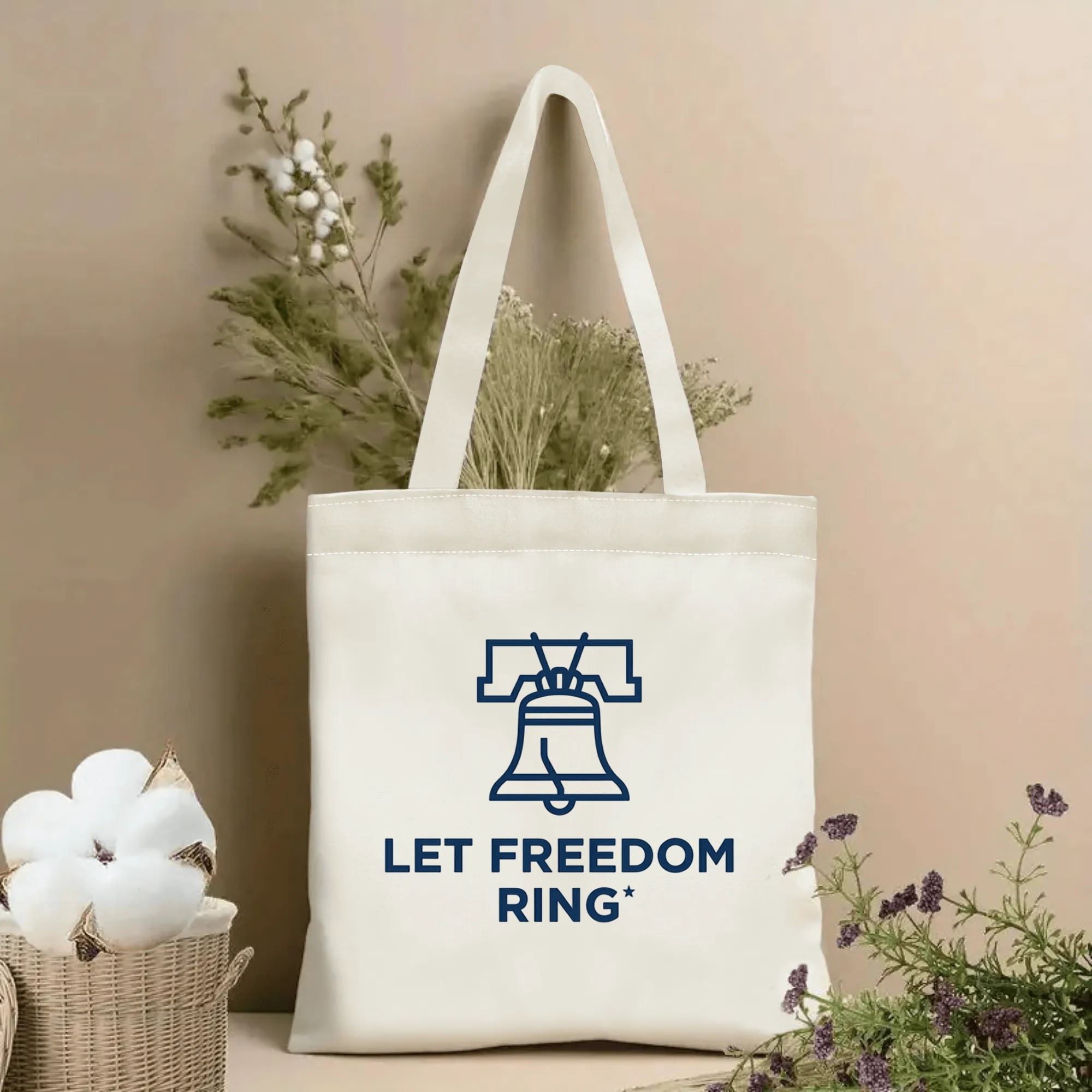 Natural canvas tote bag with minimalist navy line Liberty Bell & Let Freedom Ring patriotic print, farmhouse floral backdrop decor photo