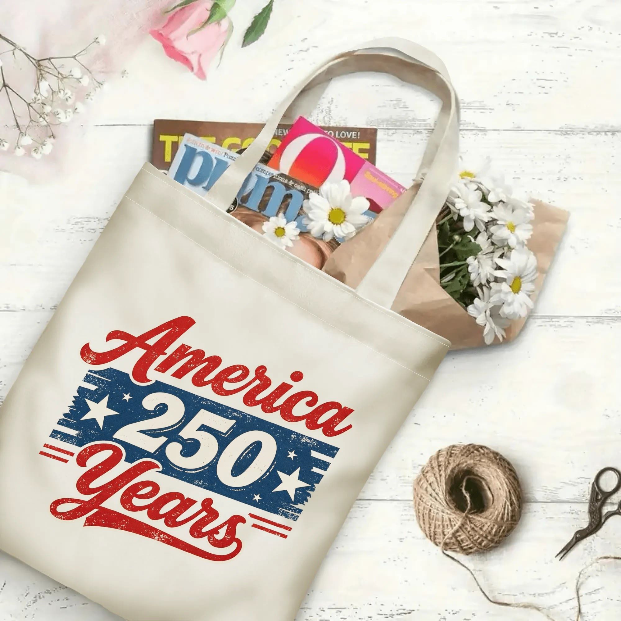 Open tote bag filled with books and flowers, demonstrating spacious interior