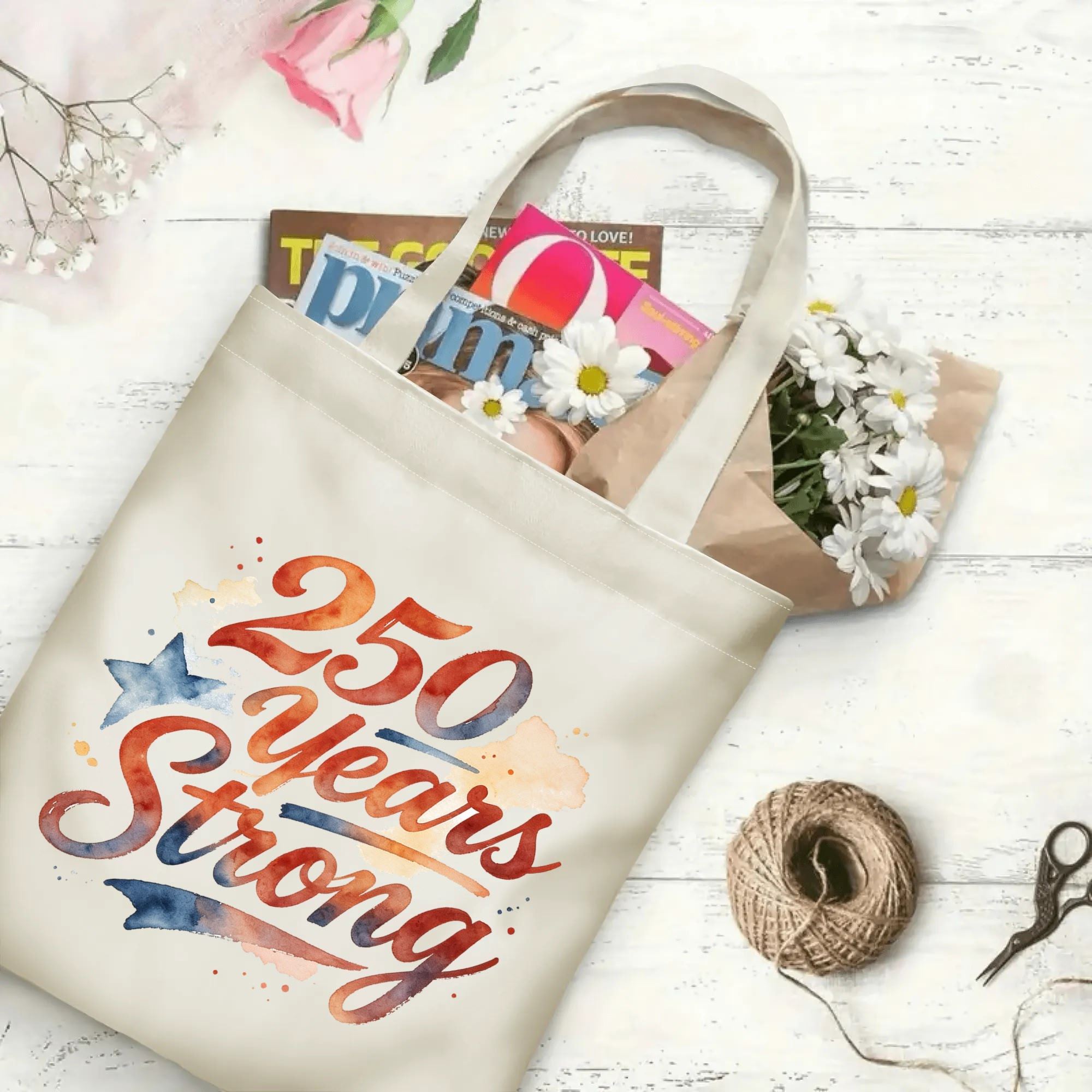Open tote bag filled with books and flowers, showcasing spacious interior