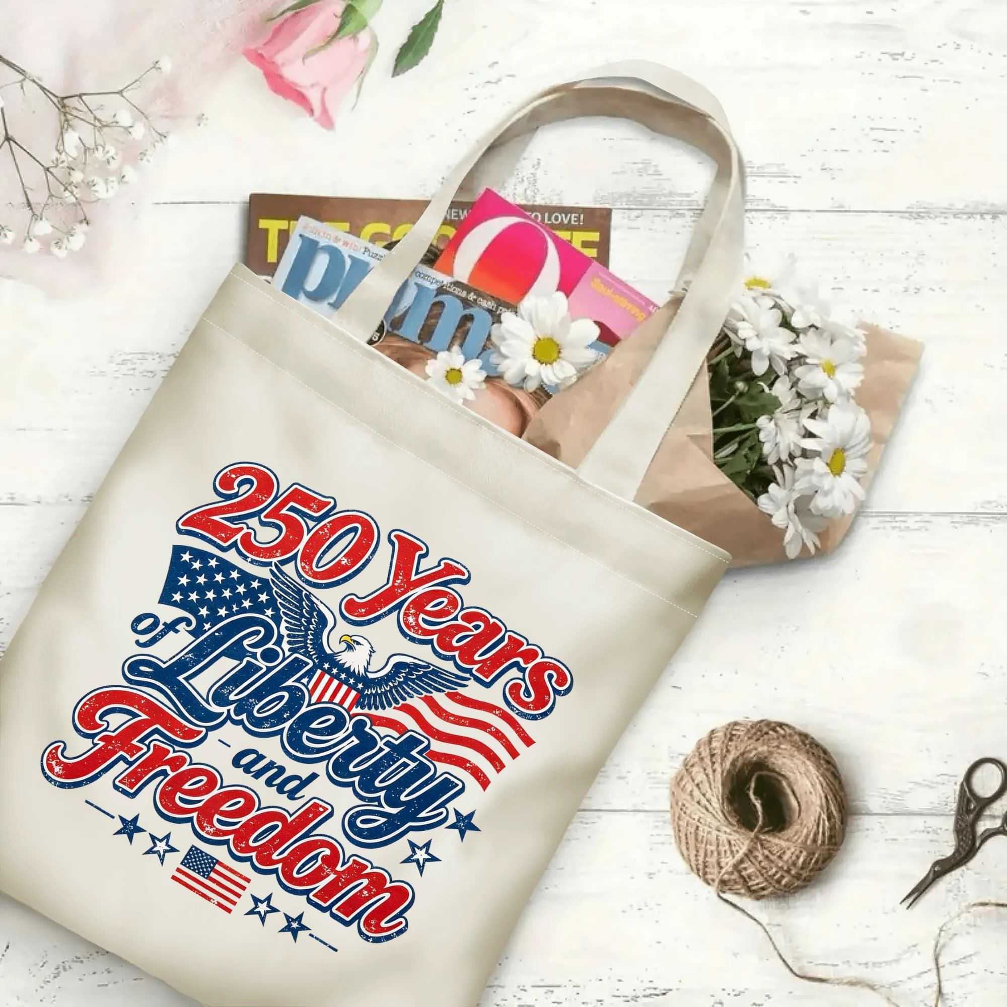 Open tote bag filled with books and flowers, showcasing the spacious interior and full print design.