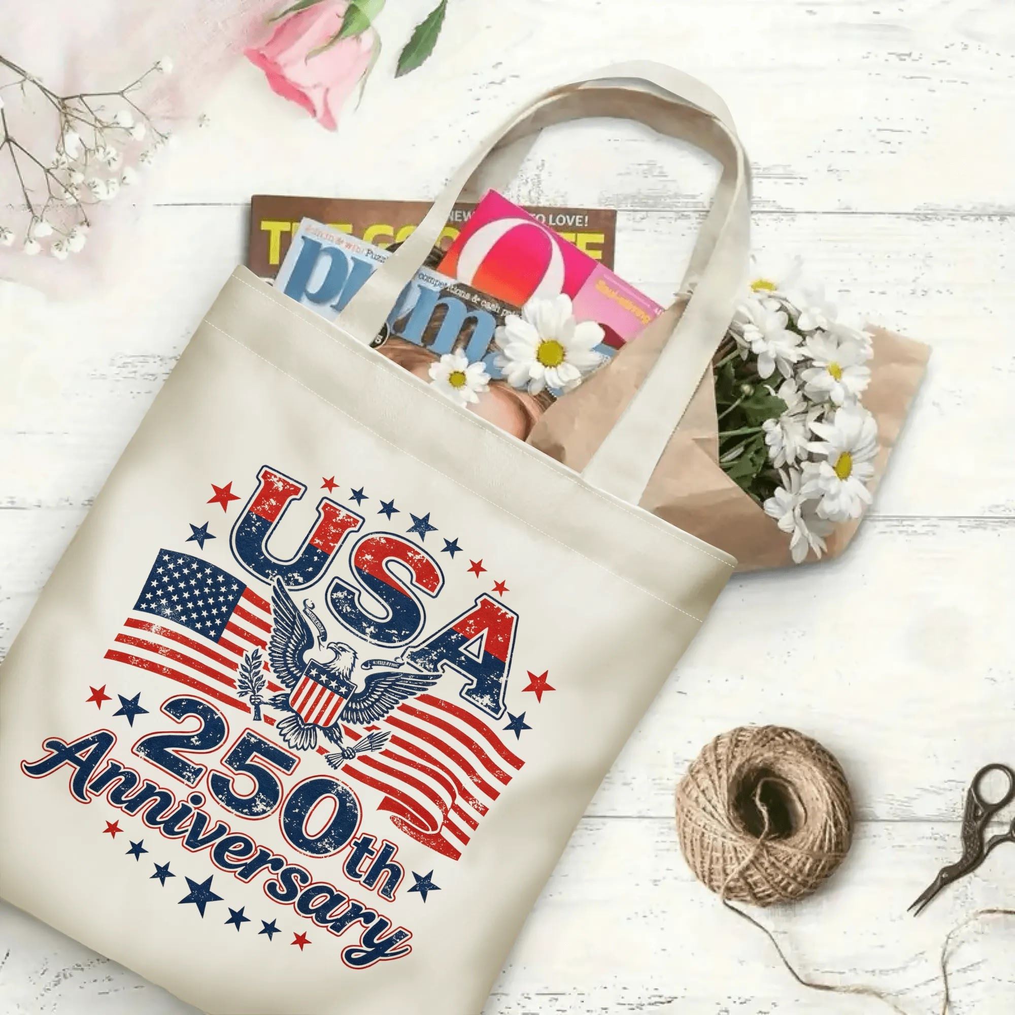 Open “USA 250th Anniversary” tote bag filled with books and flowers, showcasing the spacious interior and full print design