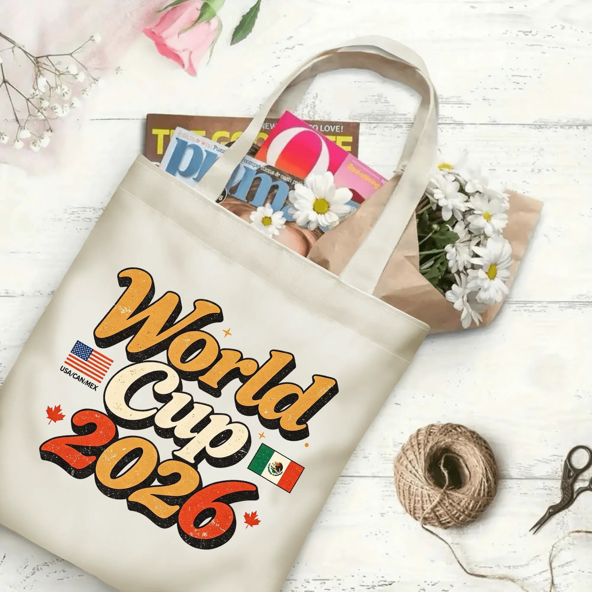The tote bag in use, filled with books and flowers, showing the “World Cup 2026” retro print in a casual, everyday setting.