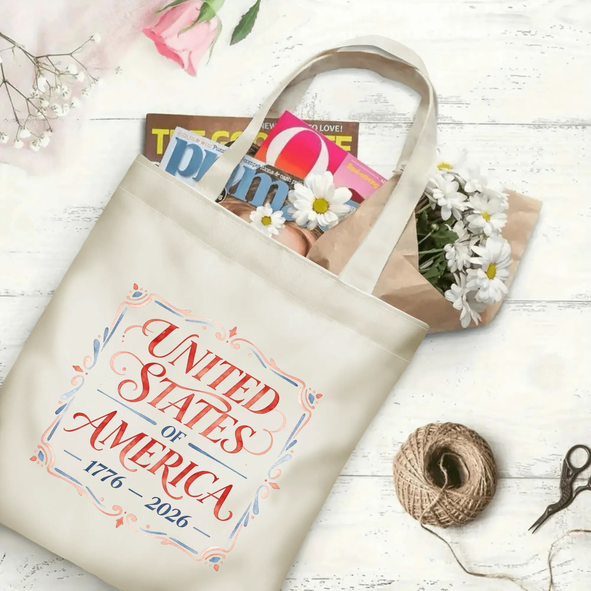 The same tote bag shown open, filled with books, flowers, and craft supplies, to display its spacious capacity.