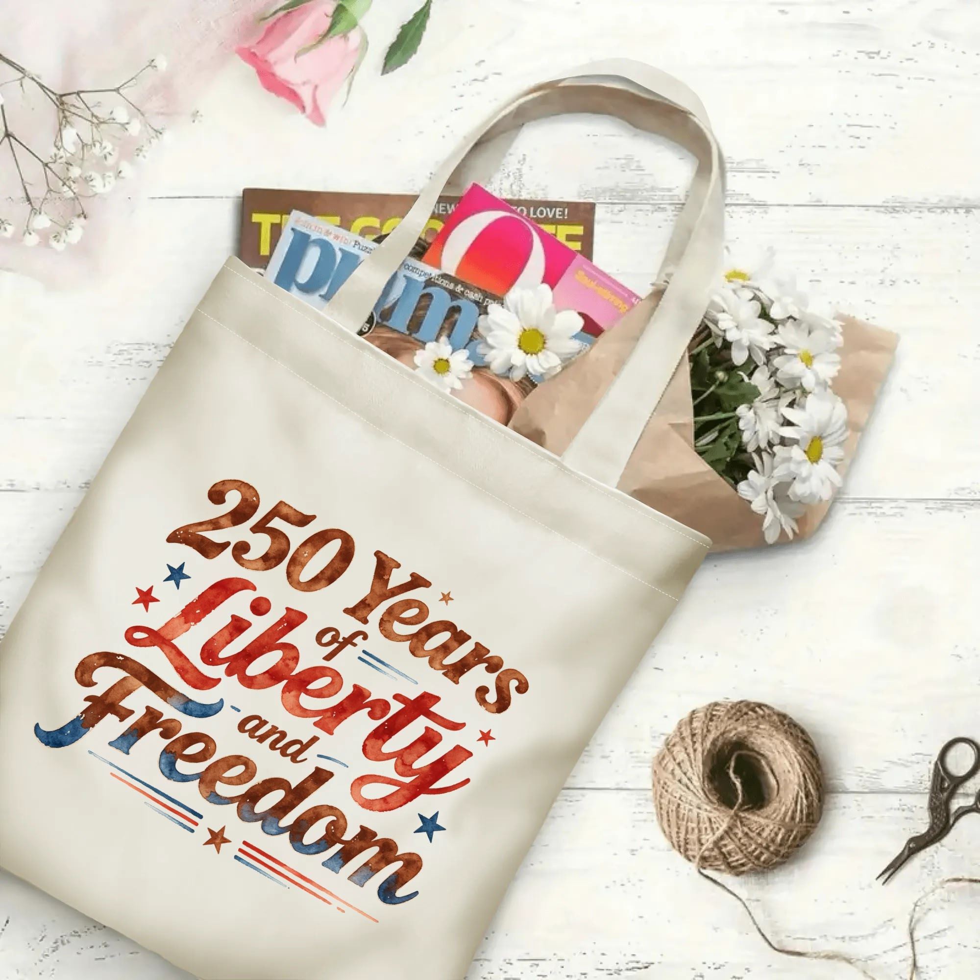The same tote bag shown open, filled with books, flowers, and craft supplies, to display its spacious capacity.