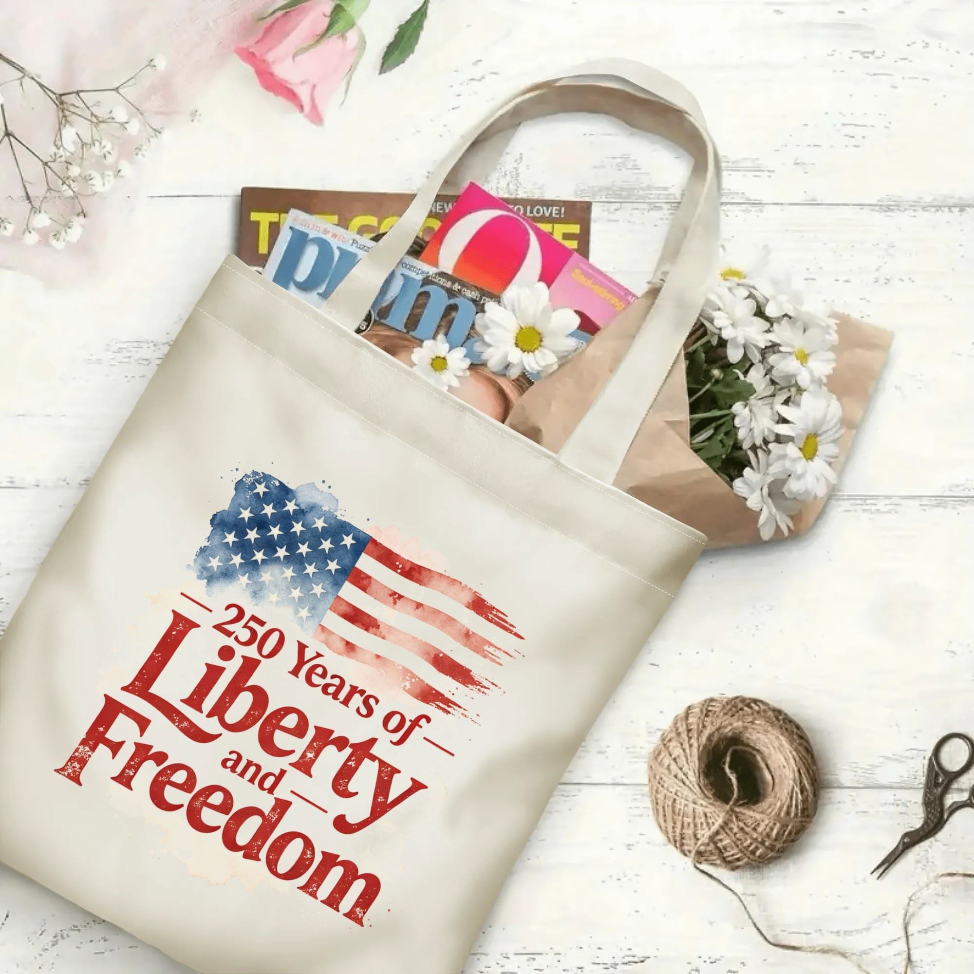 The same tote bag shown open, filled with books, magazines, and flowers, displaying its spacious capacity and print clearly.