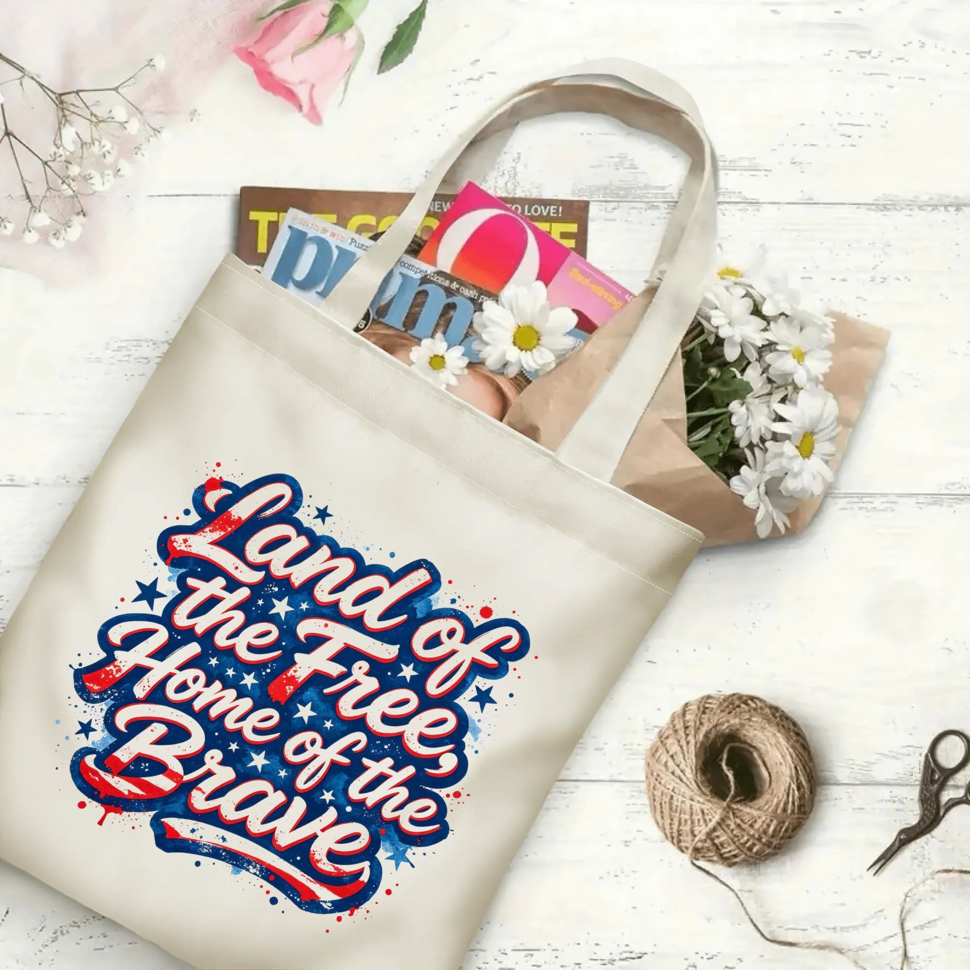 The same tote bag shown open, filled with books, magazines, and flowers, displaying its spacious capacity and print clearly.