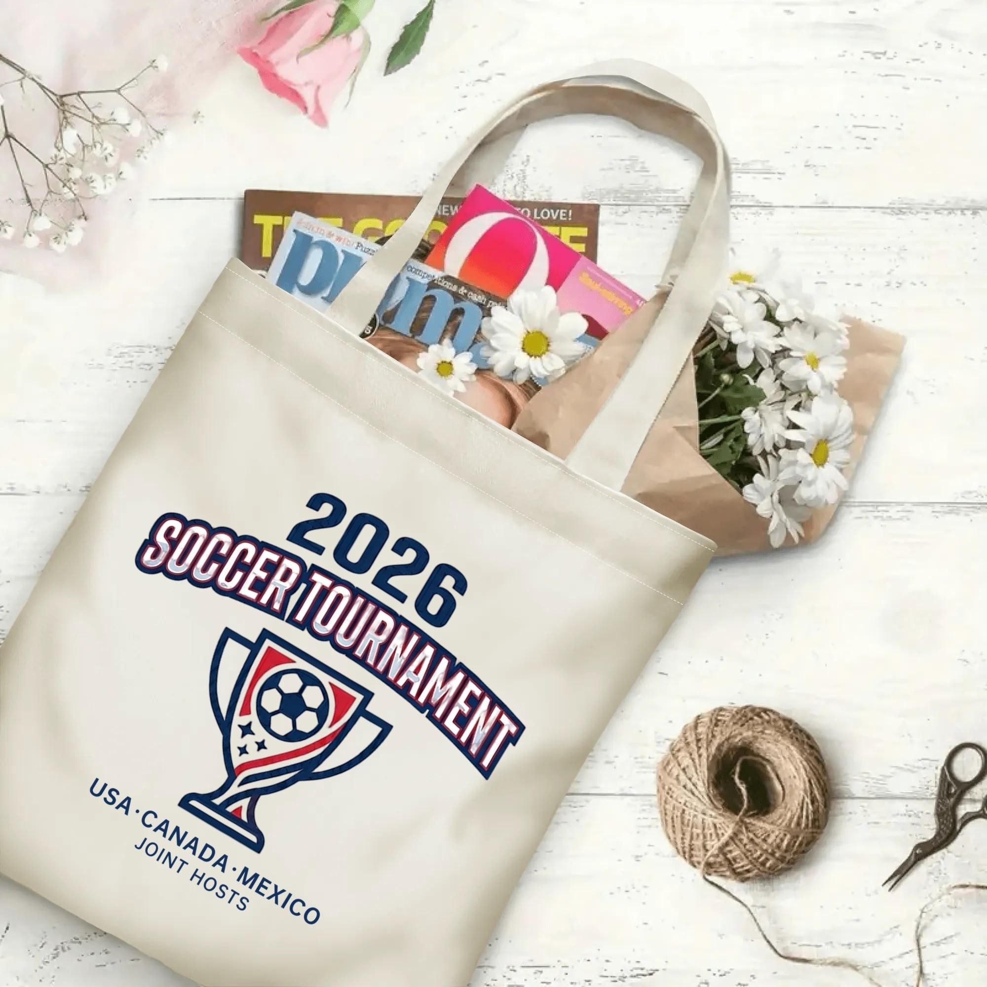 2026 soccer tournament vintage athletic trophy logo polyester canvas tote bag flat laid with magazines, daisies and twine, reusable sport fan daily shopping bag