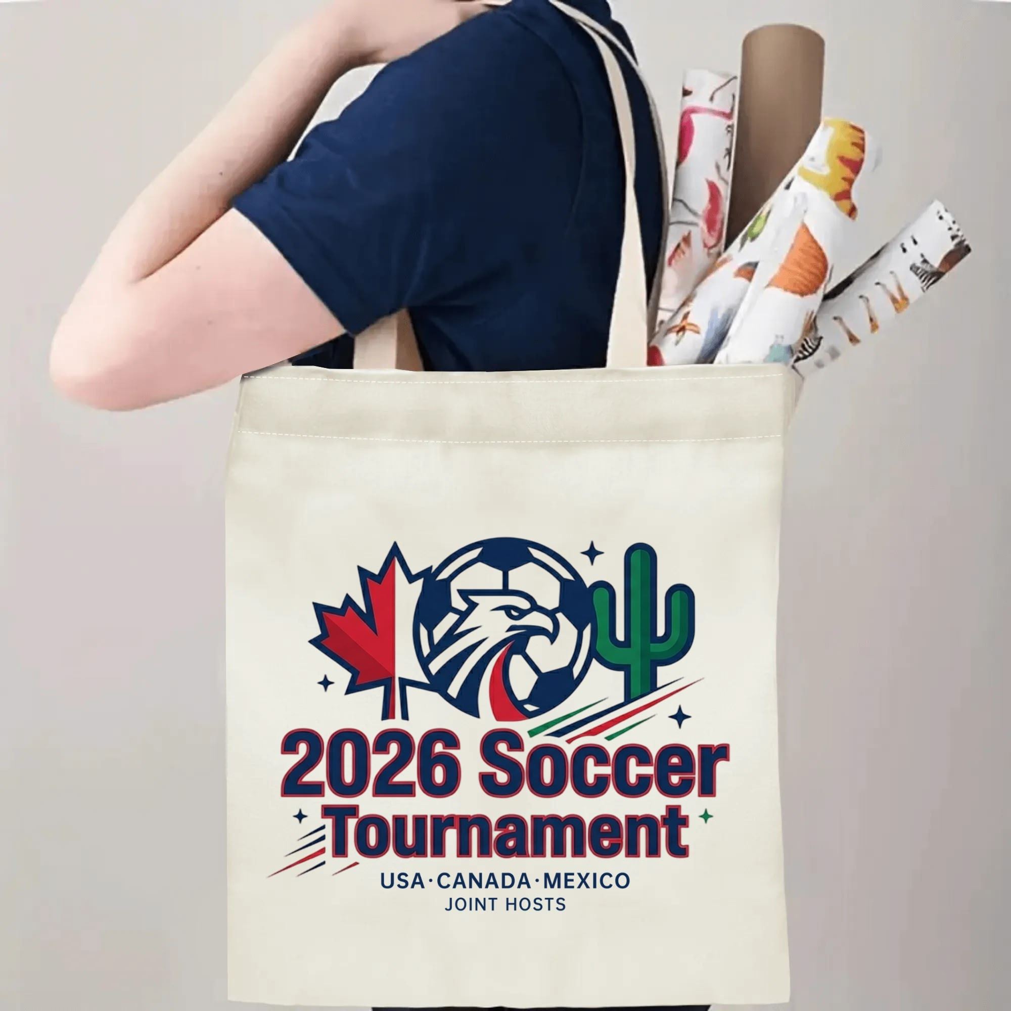 Person slinging 2026 USA Canada Mexico eagle cactus maple soccer tote bag over shoulder, large capacity vintage football fan bag for stadium trips