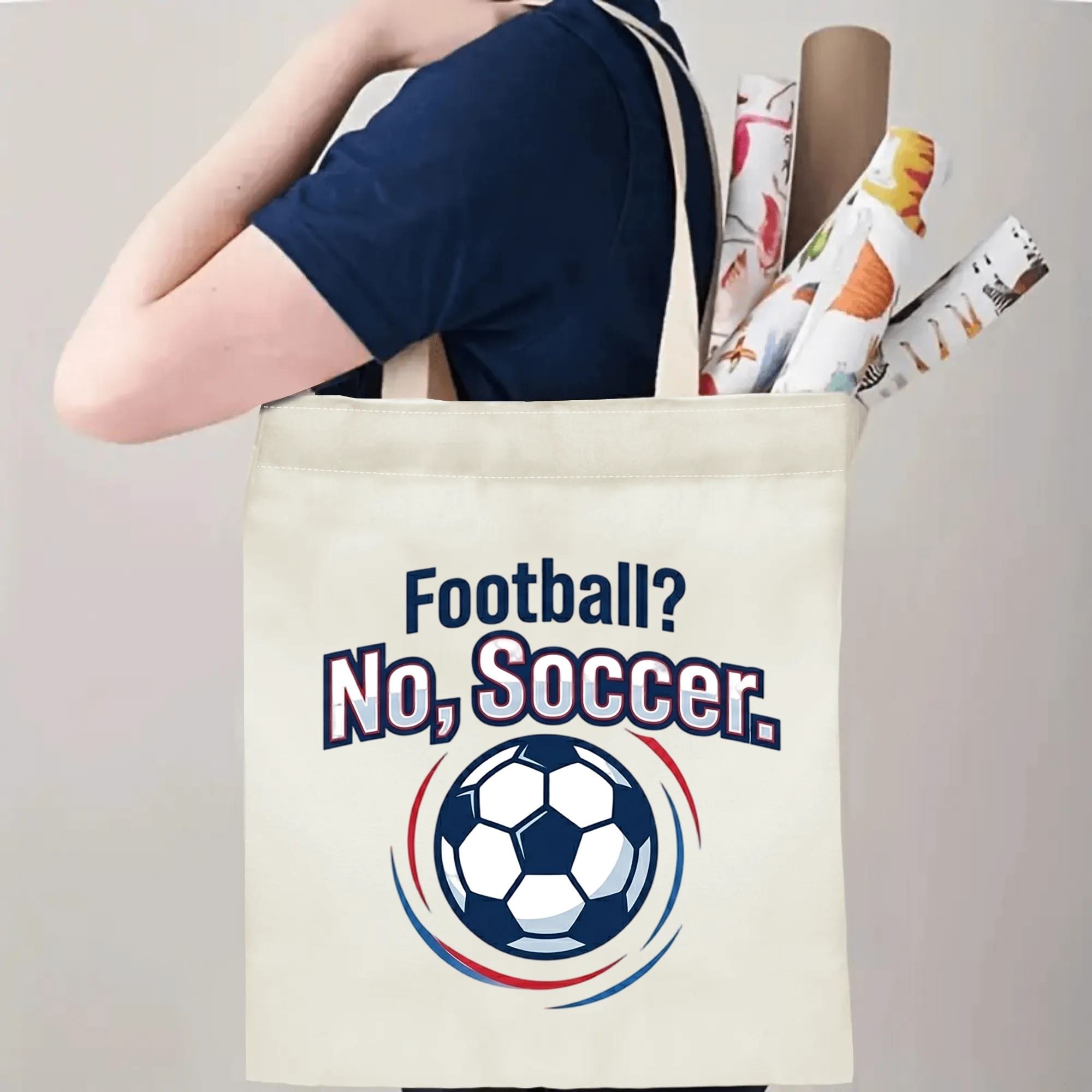 Person carrying humorous swirl soccer slogan canvas tote bag over shoulder, large capacity casual football fan carry bag for stadium game trips