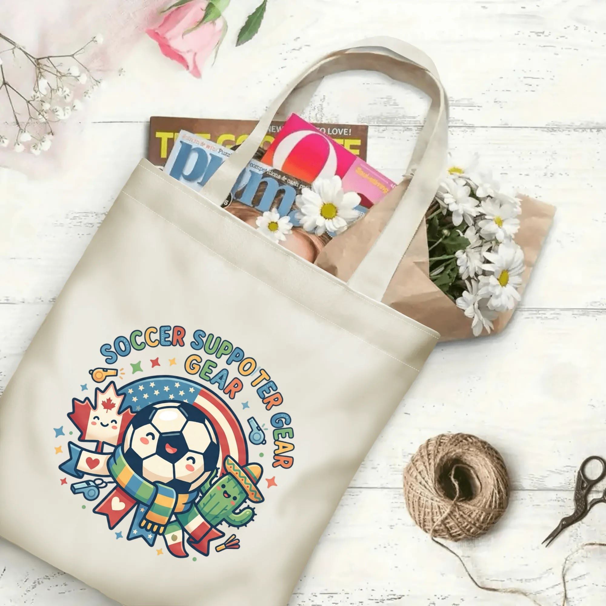 Color circular cartoon maple cactus soccer graphic canvas tote bag laid flat with magazines and daisies, reusable cute sport fan daily shopping bag