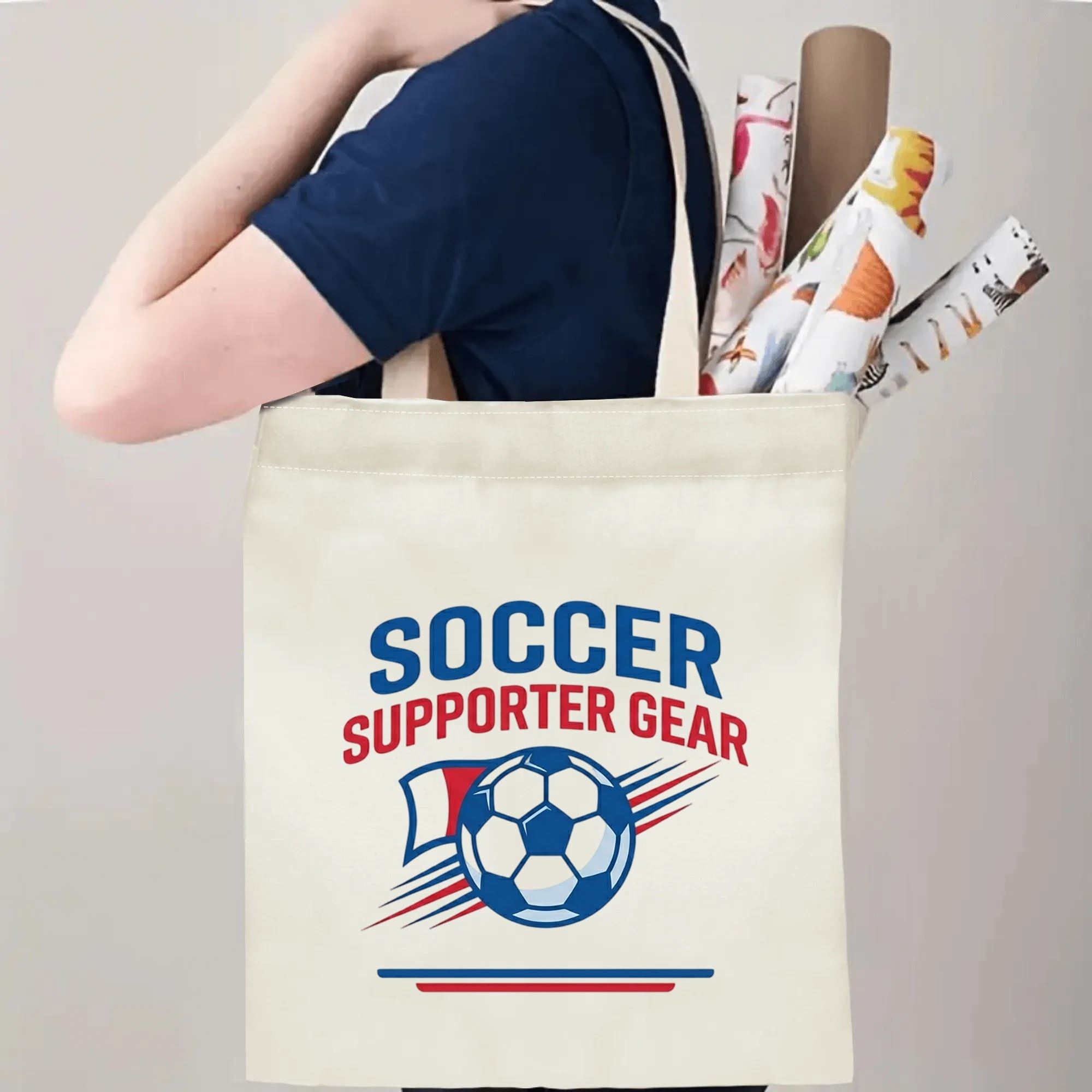 Person slinging simple retro soccer supporter canvas tote bag over shoulder, large capacity low-key sports fan carry bag for stadium trips