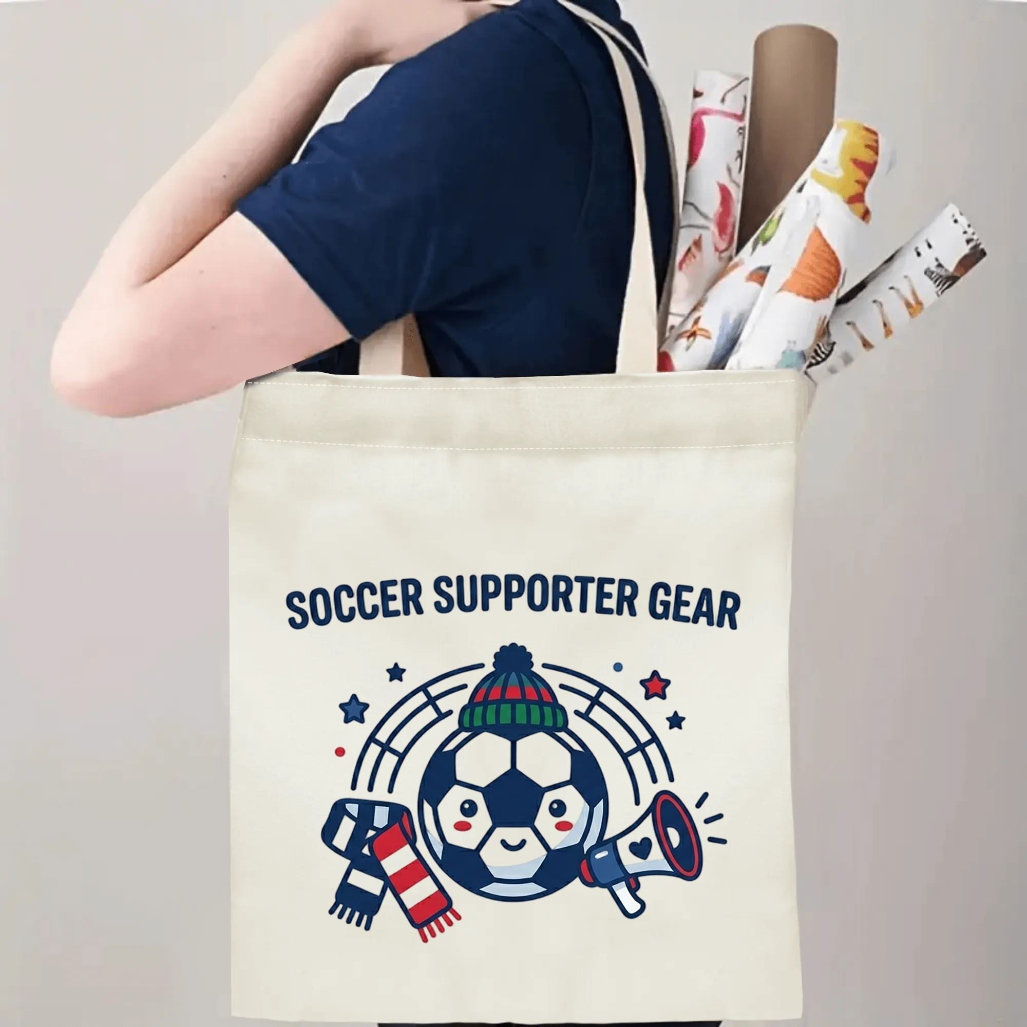 Person slinging cute soccer supporter canvas tote bag over shoulder, large capacity kawaii football fan carry bag for stadium trips