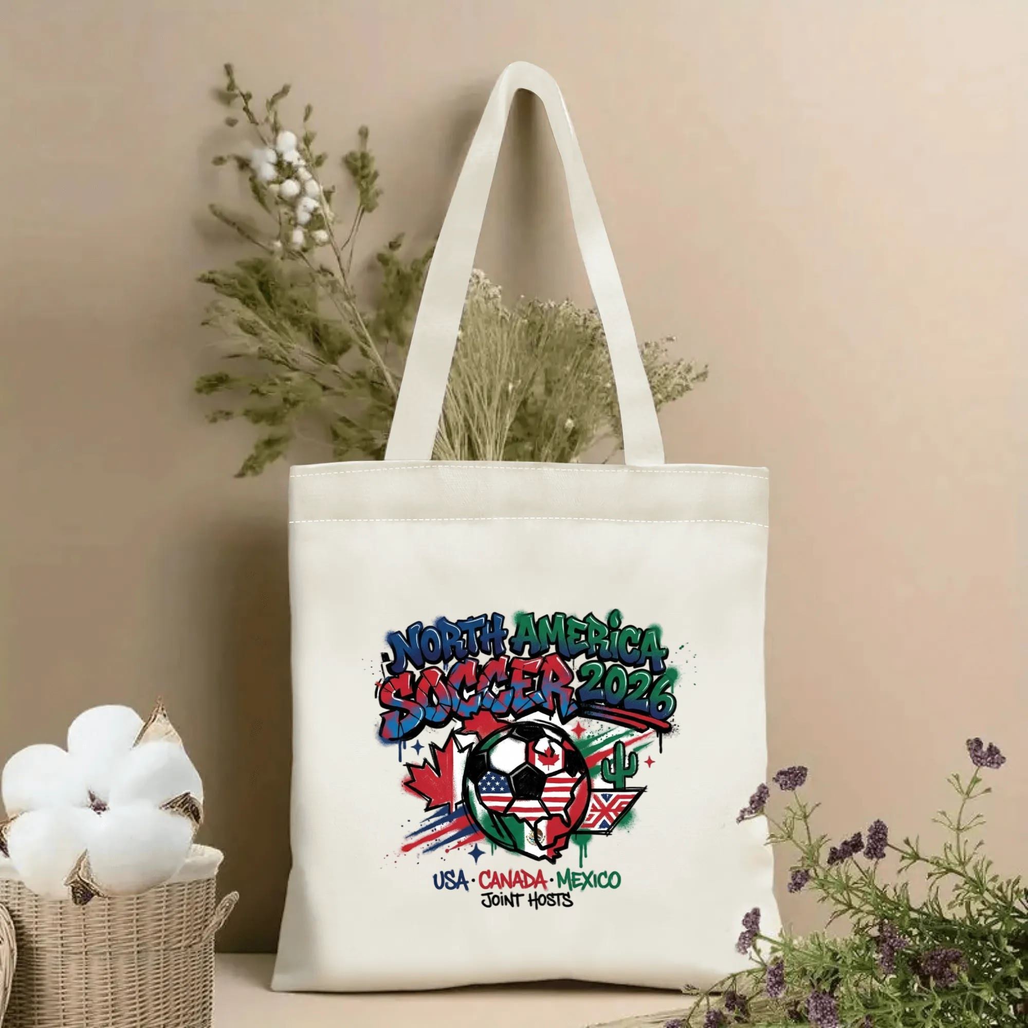 2026 World Cup drip graffiti three host country flag soccer ball print polyester canvas tote bag, trendy street art football fan eco shoulder bag indoor wall styling photo