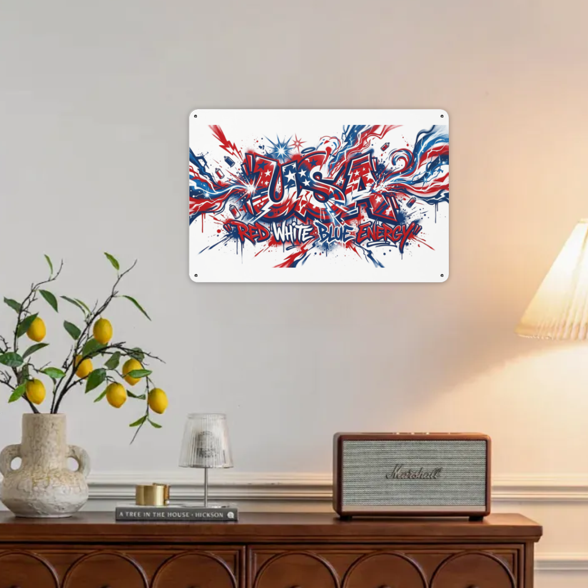 Indoor lifestyle photo: Red White Blue Energy USA graffiti tin sign mounted on plain living room wall above wooden sideboard for home patriotic decor