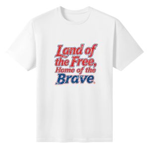 Flat lay view of the white t-shirt featuring the distressed red and blue "Land of the Free, Home of the Brave" print.