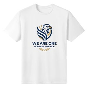Flat lay of the white T-shirt featuring a modern navy and gold eagle emblem print with "WE ARE ONE FOREVER AMERICA" text.