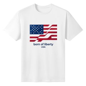 Flat lay of the white T-shirt featuring a modern wavy American flag print with "born of liberty USA" text.