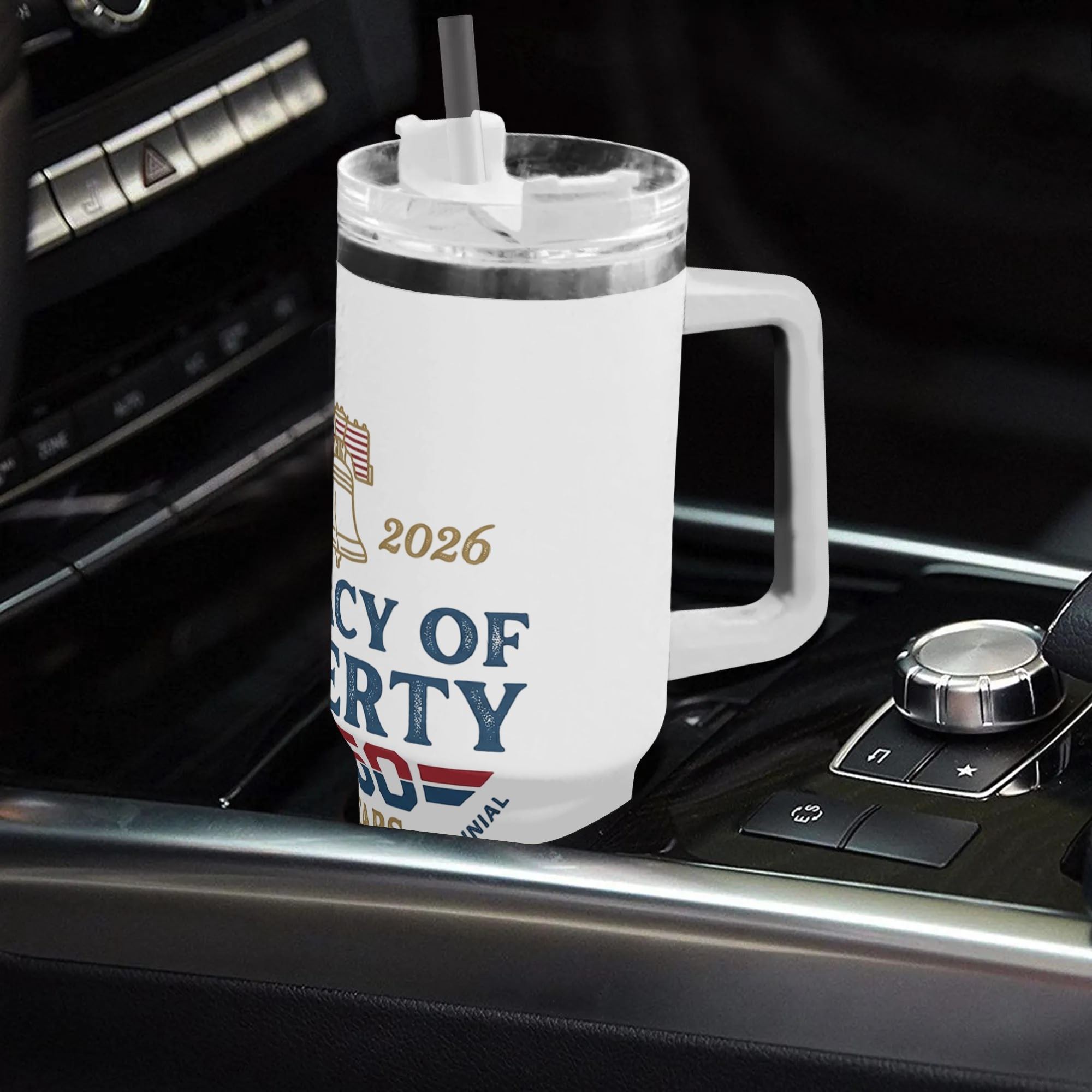 40oz USA 250th semiquincentennial patriotic tumbler with handle placed in car center console, vintage 1776-2026 Liberty Bell "Legacy Of Liberty" print insulated stainless steel travel mug