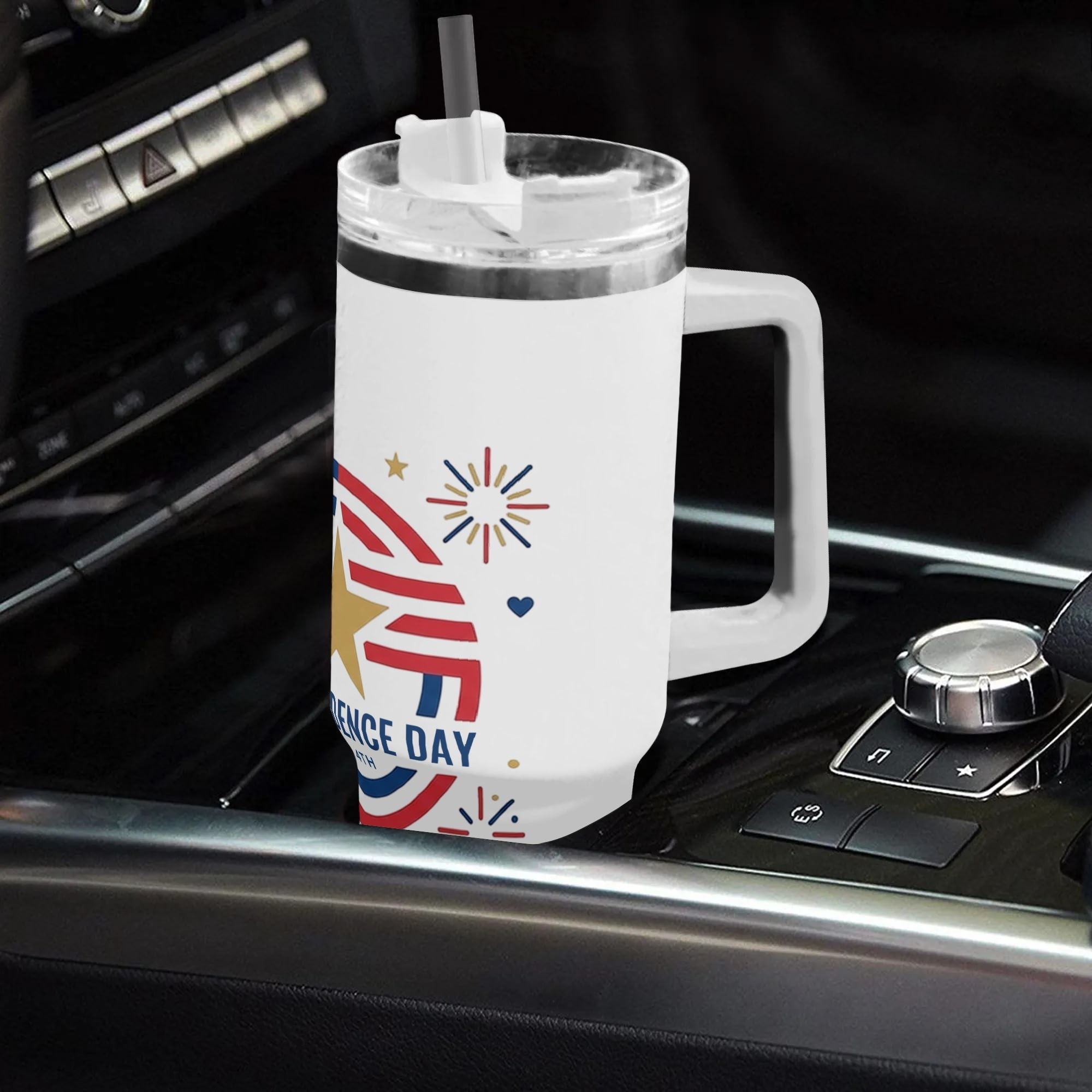 40oz July 4th Independence Day tumbler with handle placed in car gear console, minimalist circular star firework USA flag patriotic print insulated stainless steel travel mug