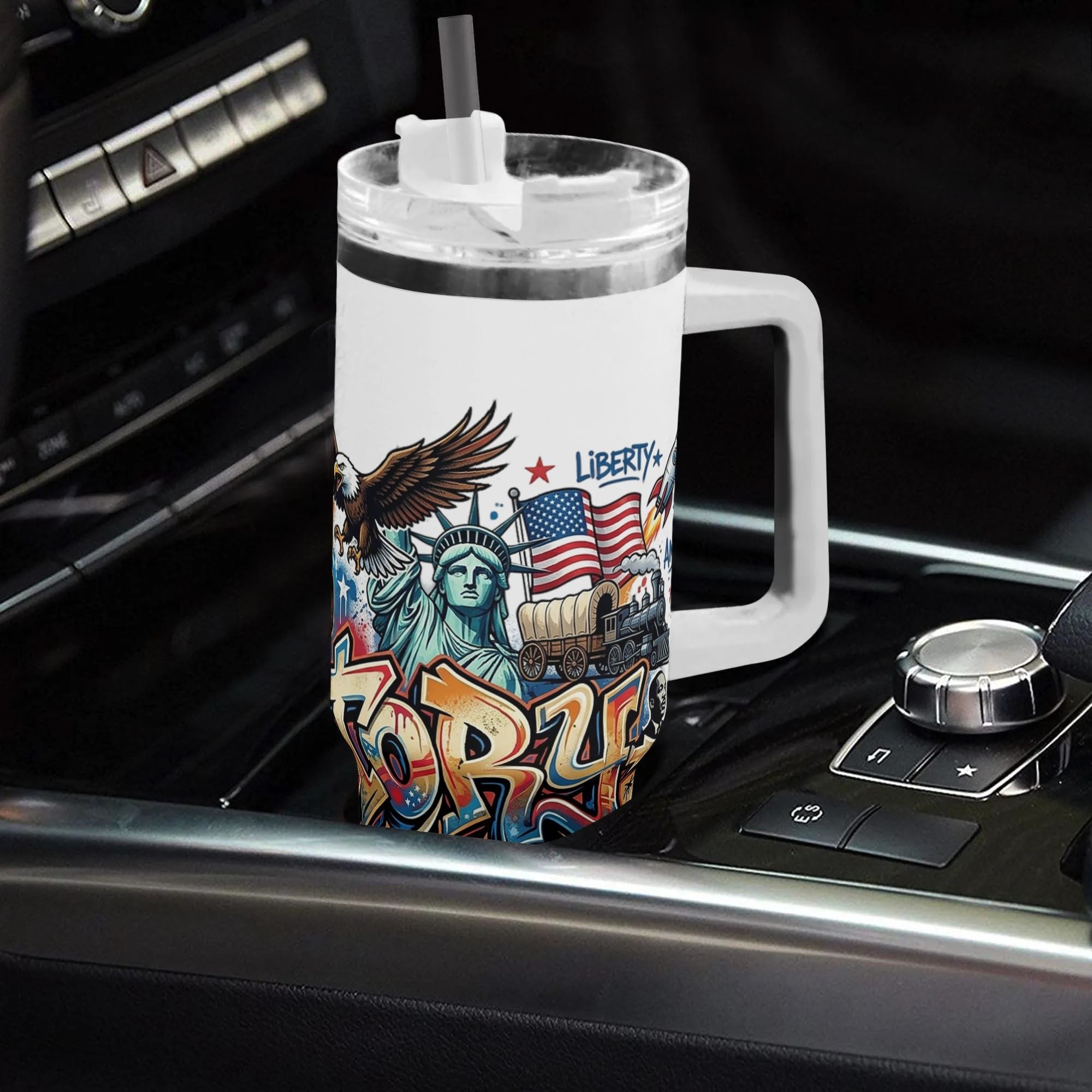 40oz USA 250th semiquincentennial tumbler with handle placed in car gear console, full wrap graffiti US history bald eagle Statue of Liberty insulated stainless steel travel mug
