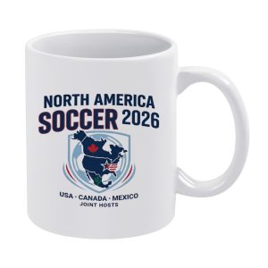 White 11oz ceramic mug with a clean "North America Soccer 2026" print, featuring a map of the host nations (USA, Canada, Mexico) with iconic symbols (maple leaf, star, cactus) and the text "USA · CANADA · MEXICO JOINT HOSTS".