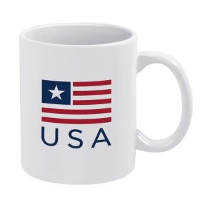 White 11oz ceramic mug with a minimalist modern American flag graphic and "USA" text below, in navy blue and red.