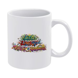 White 11oz ceramic mug with a vibrant rainbow graffiti-style print reading "LIFE LIBERTY PURSUIT OF HAPPINESS", decorated with hearts, stars, and peace signs.