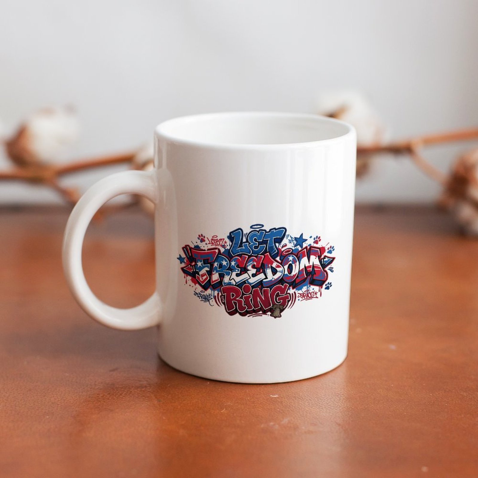 The mug displayed on a wooden table, highlighting the bold patriotic print under soft natural light.