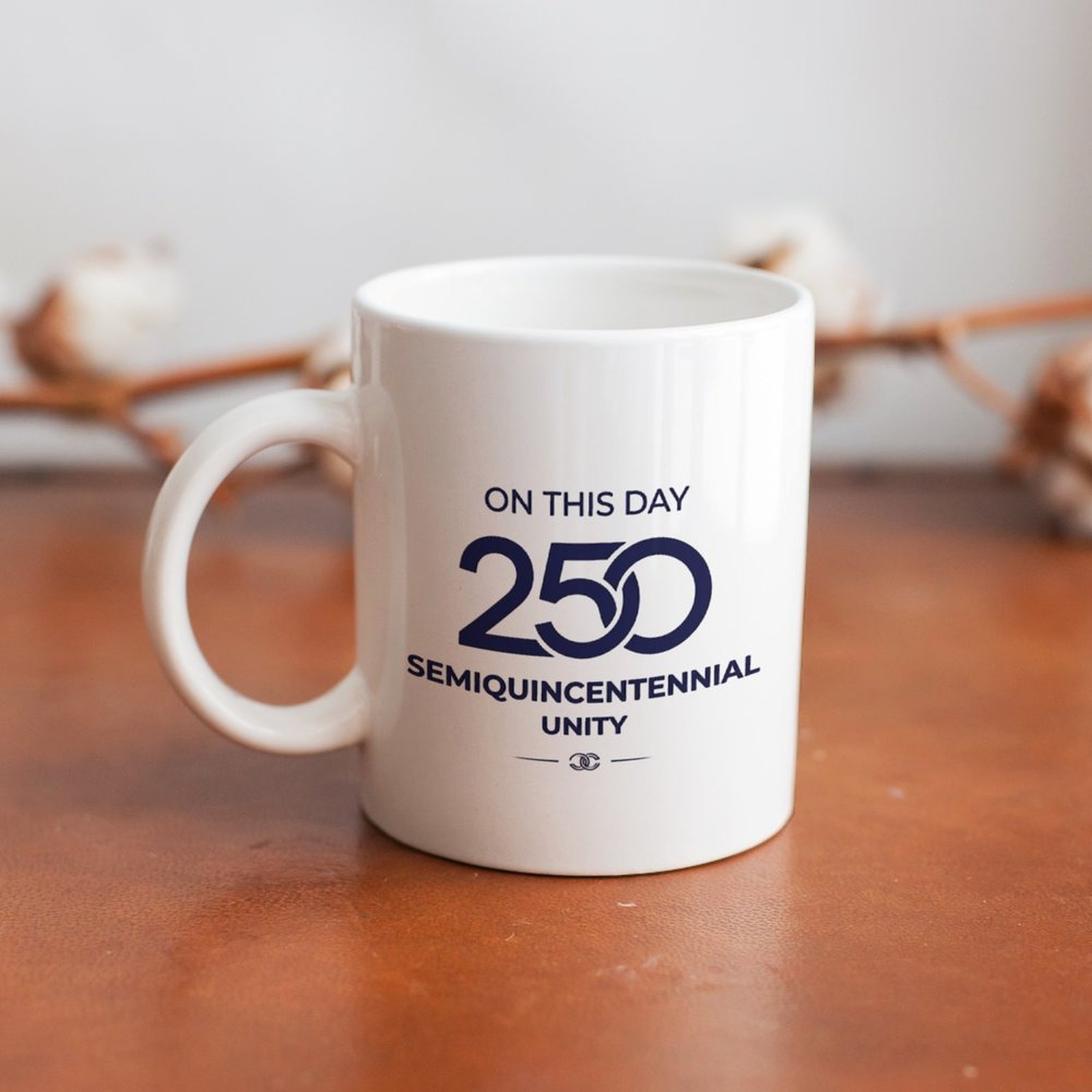 The mug displayed on a wooden table, highlighting the elegant patriotic print under soft natural light.