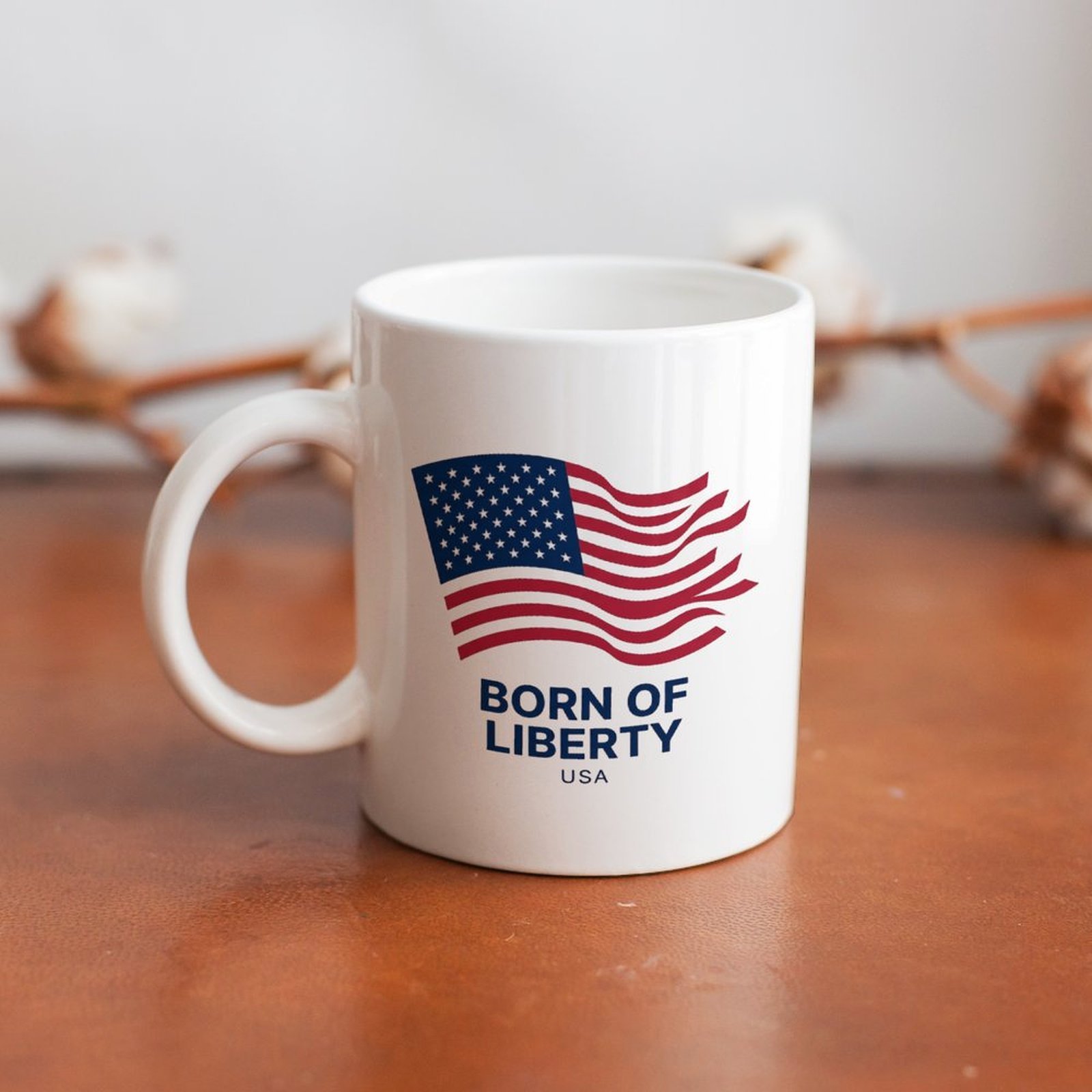 The mug displayed on a wooden table, highlighting the classic patriotic print under soft natural light.