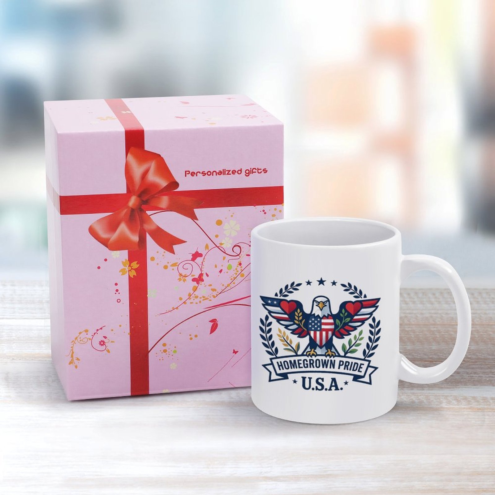 Lifestyle interior shot: Homegrown Pride eagle patriotic mug displayed on warm wooden table with cotton sprig background for home and office desk decor
